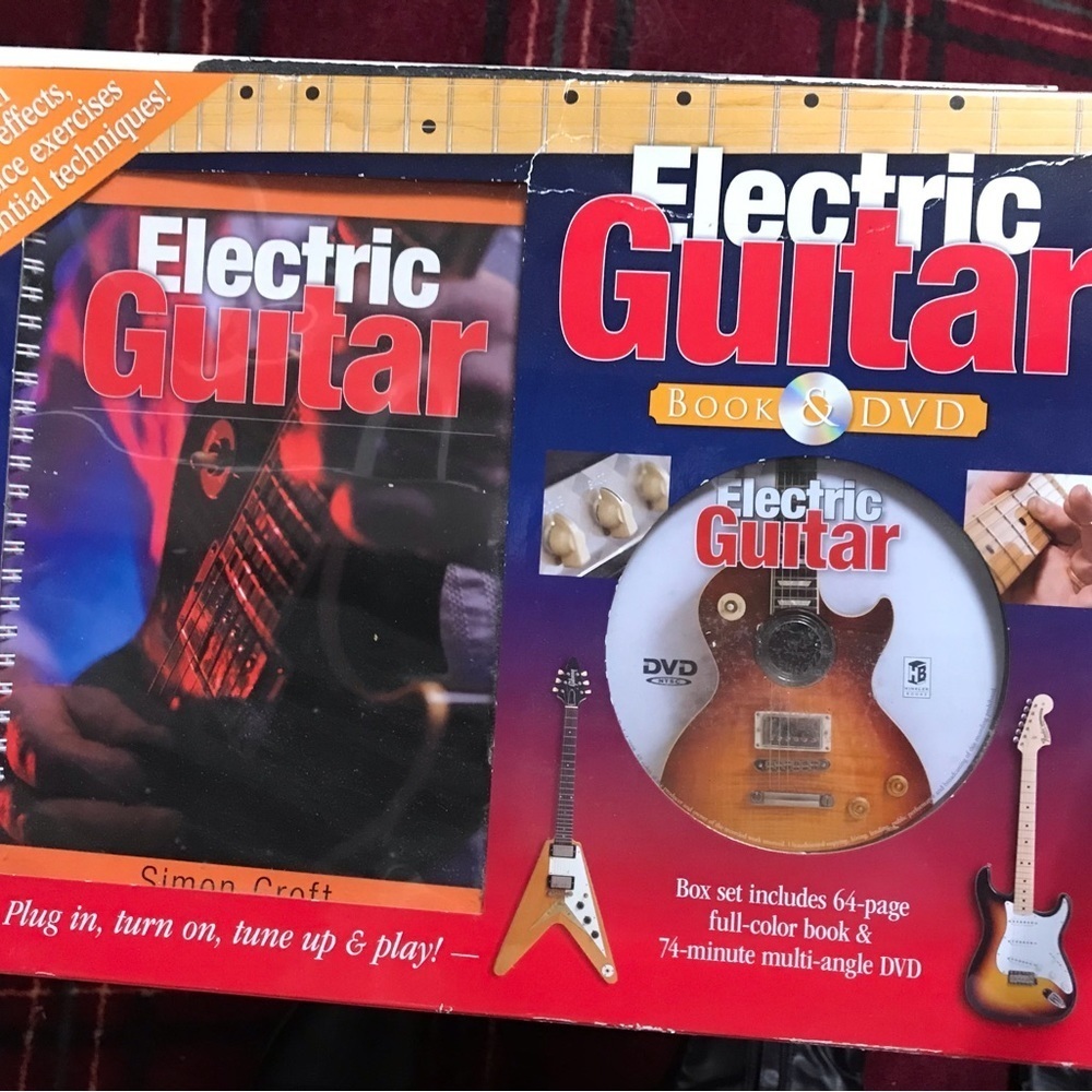 Dvd & guitar Book set opened never used guitar